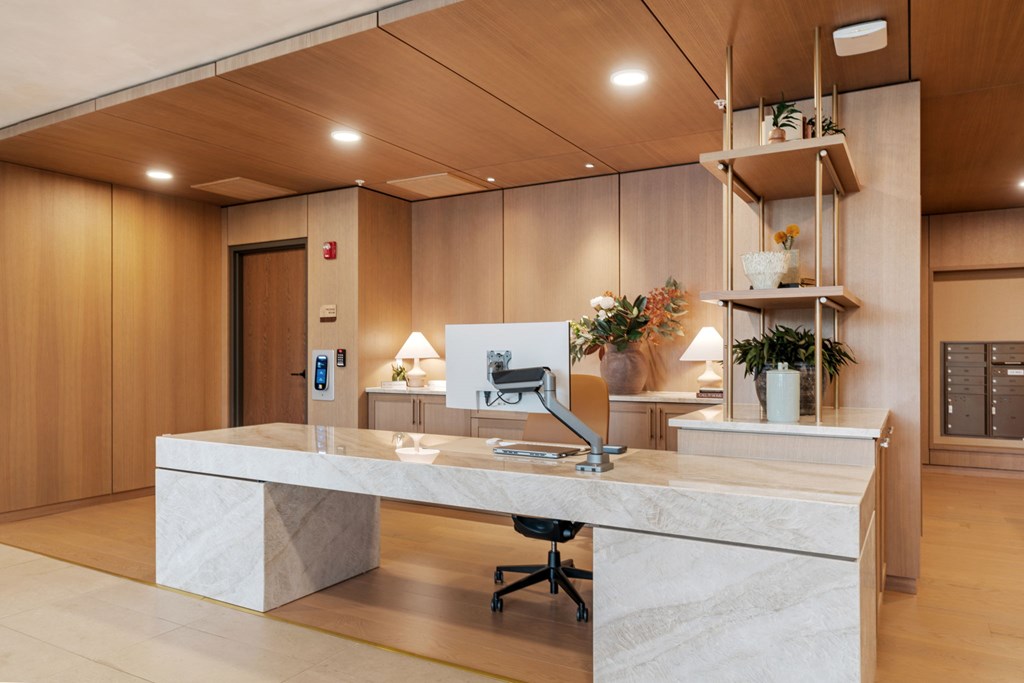 The lobby, leasing offices, and mailroom at Lilia in Lilydale, MN 55118