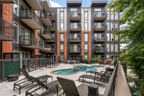 Outdoor pool deck at The Flats at West End Apartments, Minnesota