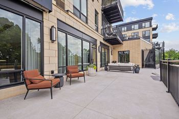 The outdoor Game Terrace outside of the Game Lounge at Lilia Apartments in Lilydale, MN 55118