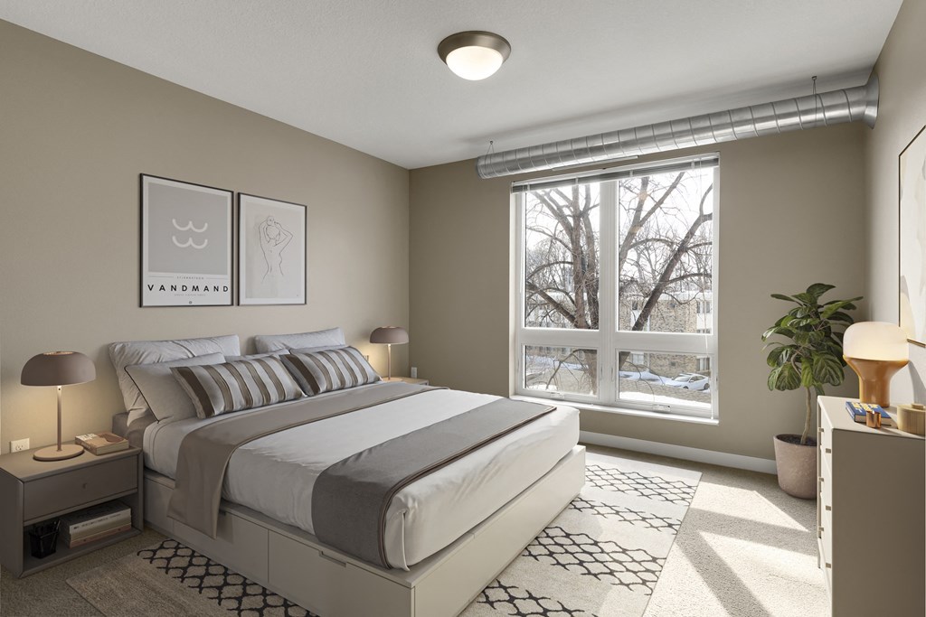 a bedroom with a large window and a bed at Be @ Axon Green, Minnesota, 55416