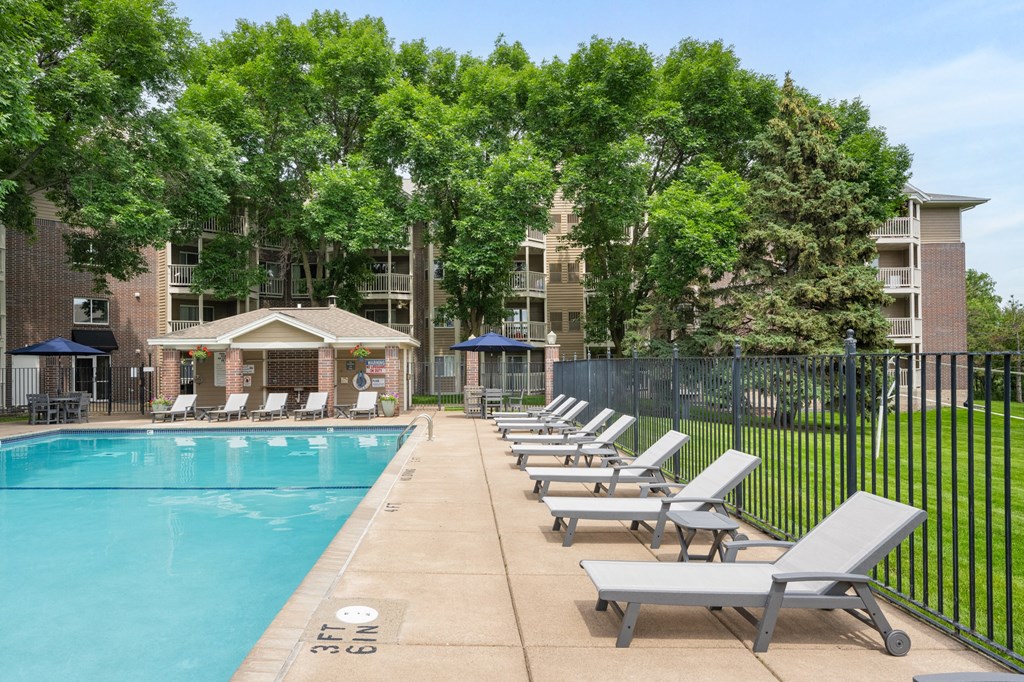 our apartments have a resort style pool with lounge chairs at Cityscape, St Louis Park, MN, 55416