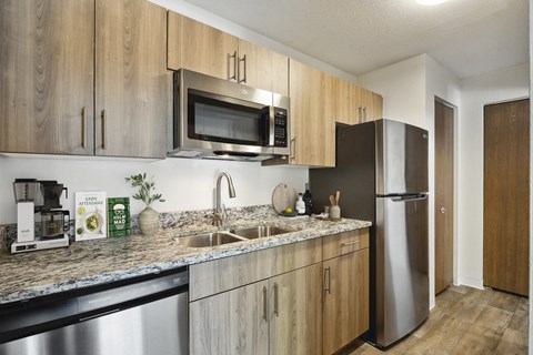 our apartments offer a kitchen with stainless steel appliances and granite counter tops