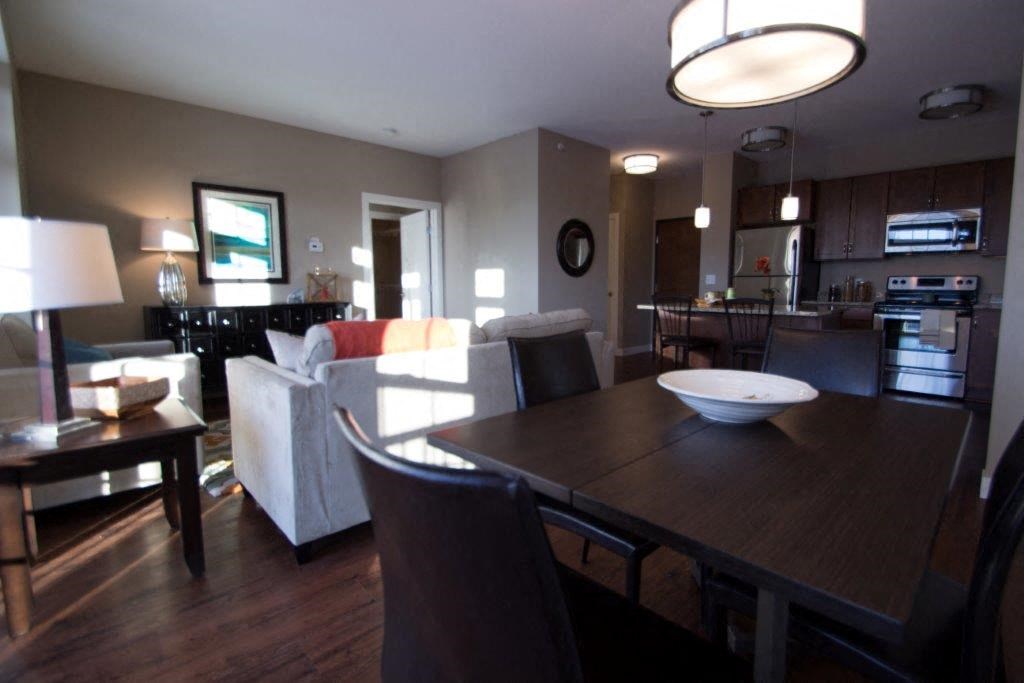 a view of the living room and dining room from the kitchen