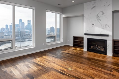 a living room with a fireplace and a view of the city at Expo, Minnesota
