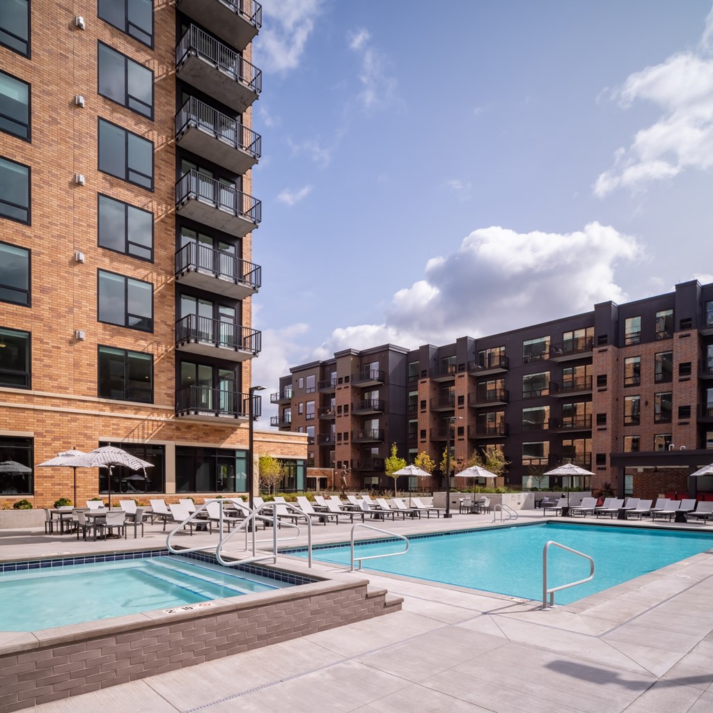 a swimming pool in front of a large apartment building at Expo, Minneapolis Minnesota