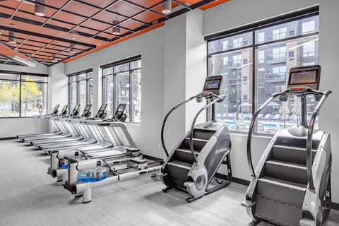 a gym with cardio equipment and exercise machines at Expo, Minnesota, 55414