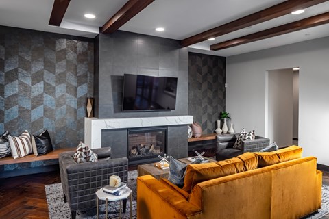 a living room with a fireplace and a tv above it at Expo, Minneapolis, 55414