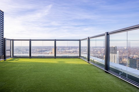a lawn on the balcony of a skyscraper with a city view at Expo, Minneapolis, MN