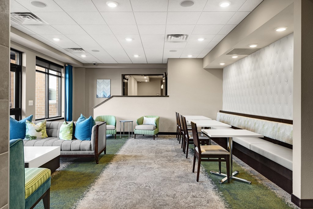 Club Room a seating area with couches chairs and tables  at Gabella at Parkside, Apple Valley, MN