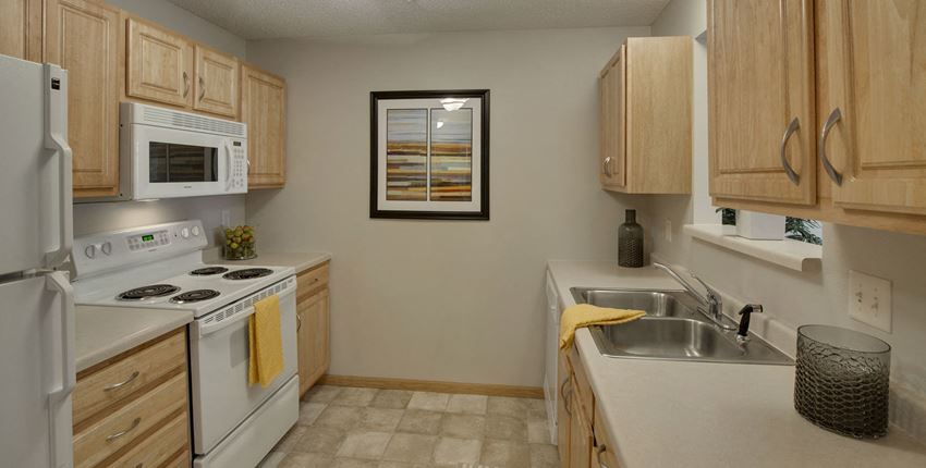 Heritage Place Apartments 55+ Community in Rogers, MN Kitchen - Photo Gallery 1