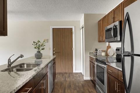 our apartments offer a modern kitchen with granite counter tops and stainless steel appliances