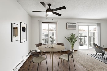 Lou Park Apartments in St. Louis Park, MN Dining Room and Private Deck - Photo Gallery 3