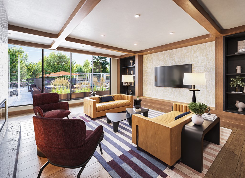 a living room with couches and chairs and a television at The Mera, Minnesota