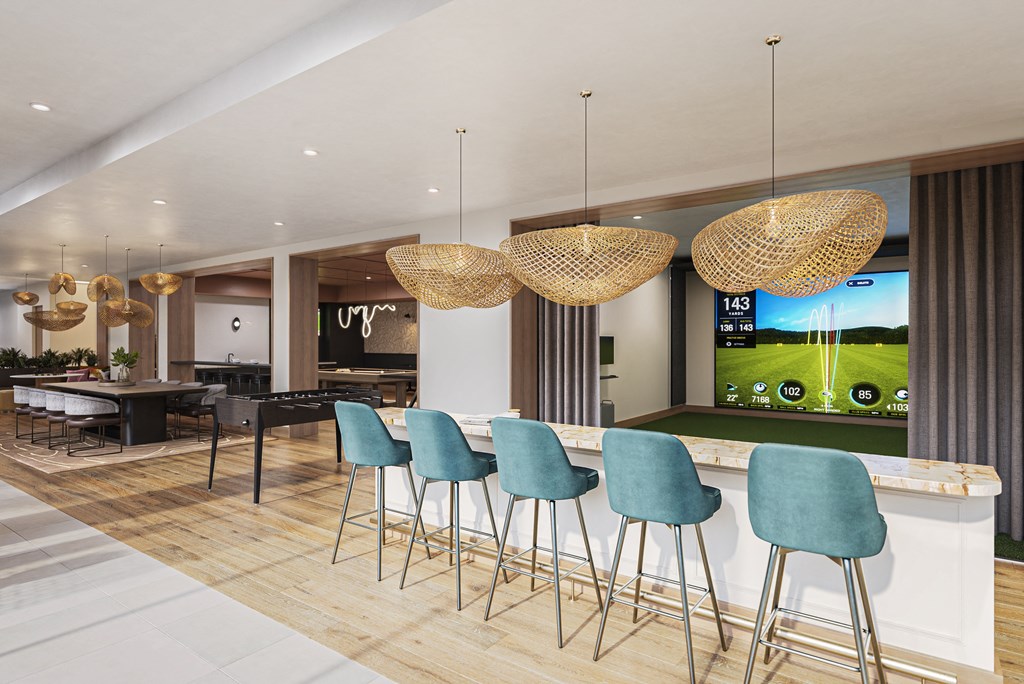 a lobby with a bar and stools and a tv on the wall at The Mera, Minnesota 