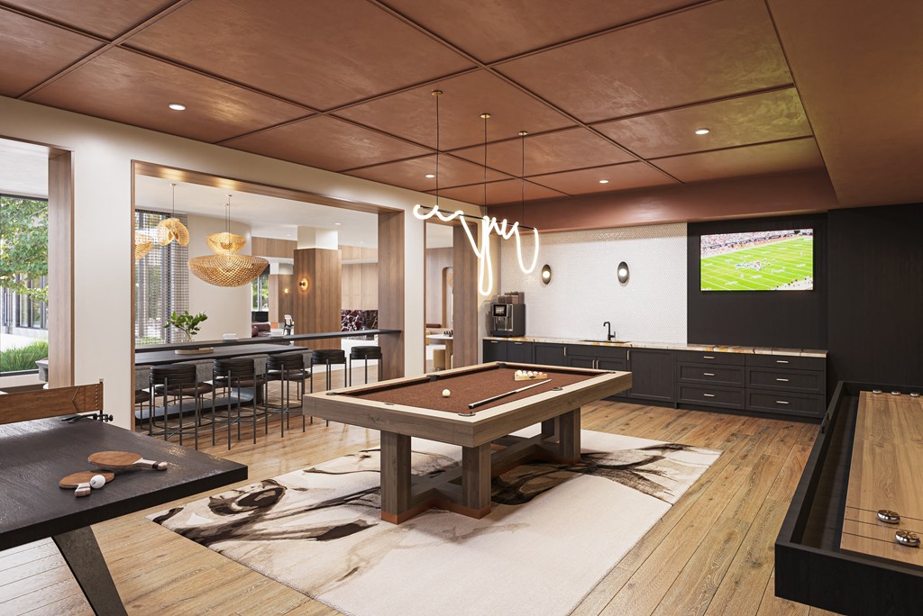 a game room with a pool table and a televisionat The Mera, St Louis Park, 55426