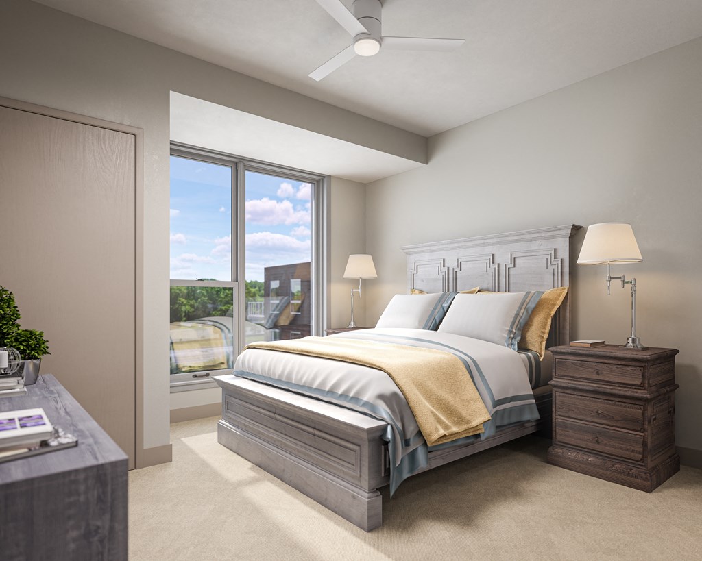 a bedroom with a bed and a window at The Mera, St Louis Park Minnesota