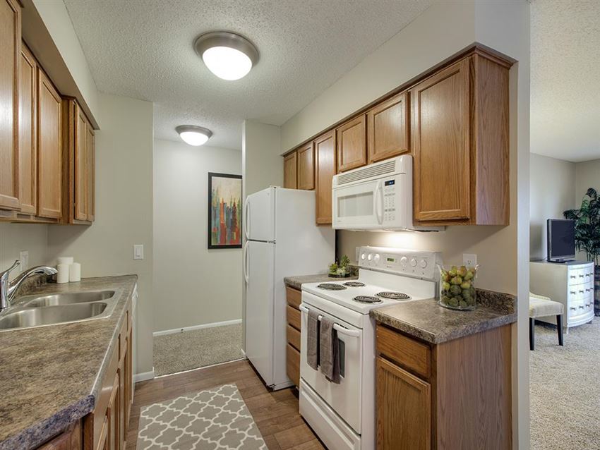 Oakwood Kitchen Oakwood Apartments in Plymouth, MN Kitchen