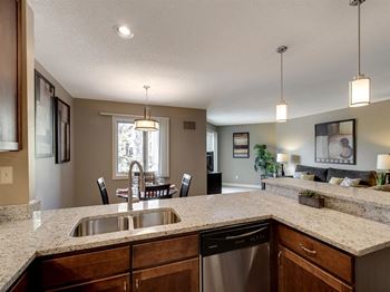 MacLaren Hill Apartments in St. Paul, MN Kitchen Granite Countertops