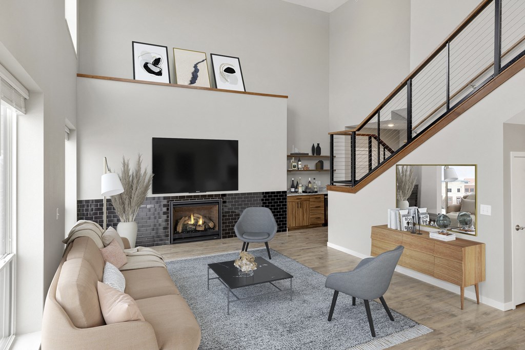 Living room with couch and table at Nuvelo at Parkside, Apple Valley