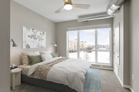 Bedroom With Expansive Windows at Nuvelo at Parkside, Apple Valley, MN