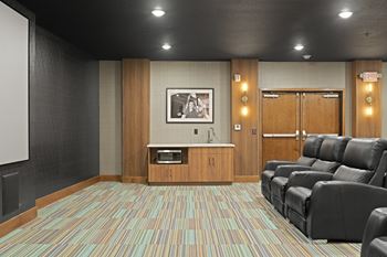 Movie room setup at Nuvelo at Parkside Apartments