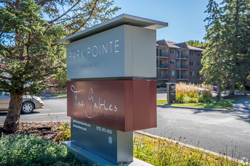a screenshot of a game interface with trees and a house at Park Pointe, Minnesota, 55426