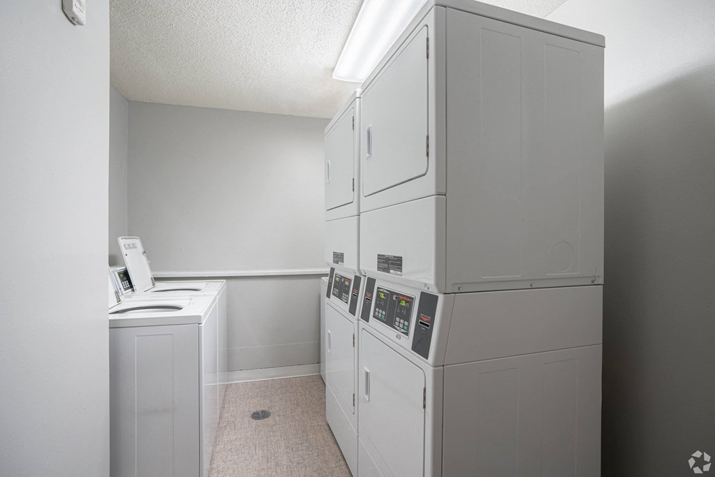 a white kitchen with white appliances and a white counter top at Park Pointe, Minnesota