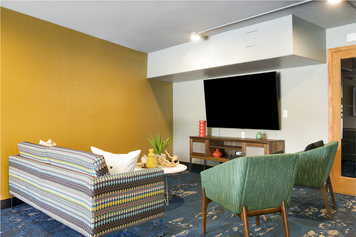 Lounge Area With TV  at Pebblebrook Court, Bloomington, Minnesota
