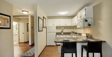 Spacious Kitchen with world-class amenities Ridgewood Arches Apartments Living Room with white countertops in Minneapolis, Minnesota