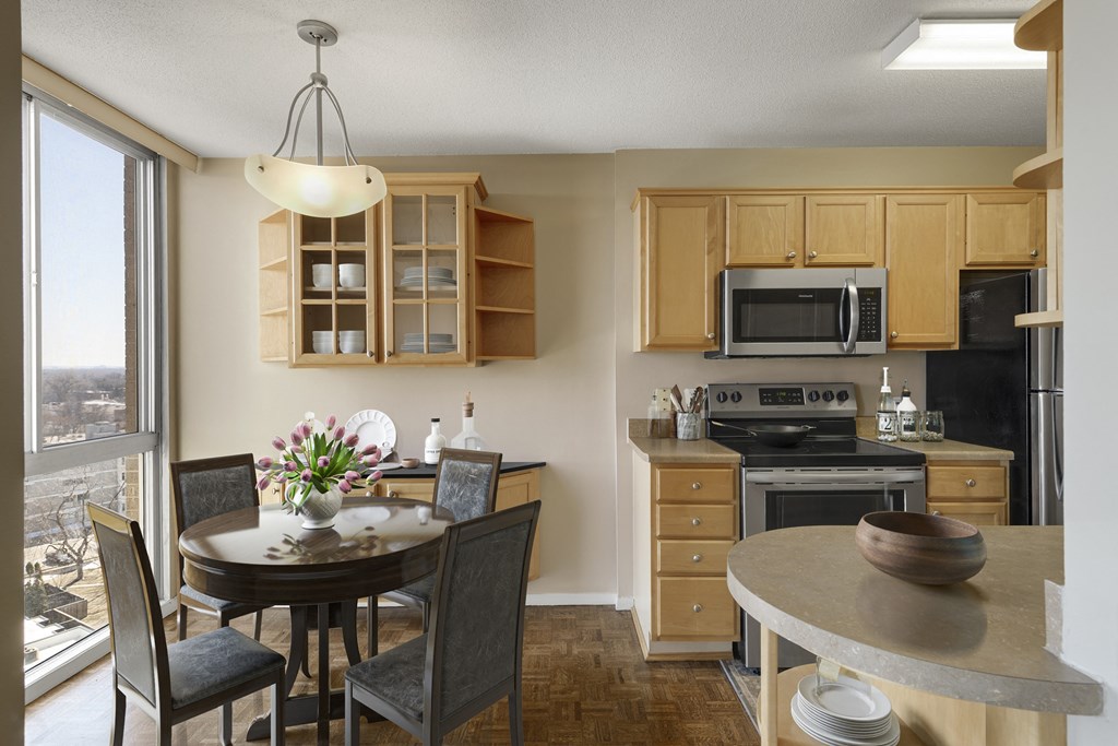 a kitchen and dining area at The Edina Towers, Edina, Minnesota