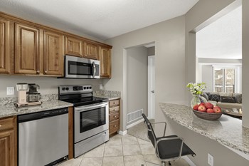 Kitchen with appliances Kitchen with appliances at The Riverwood, Lilydale, MN - Photo Gallery 2