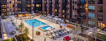 an overhead view of a swimming pool in front of an apartment building at Expo, Minneapolis, MN