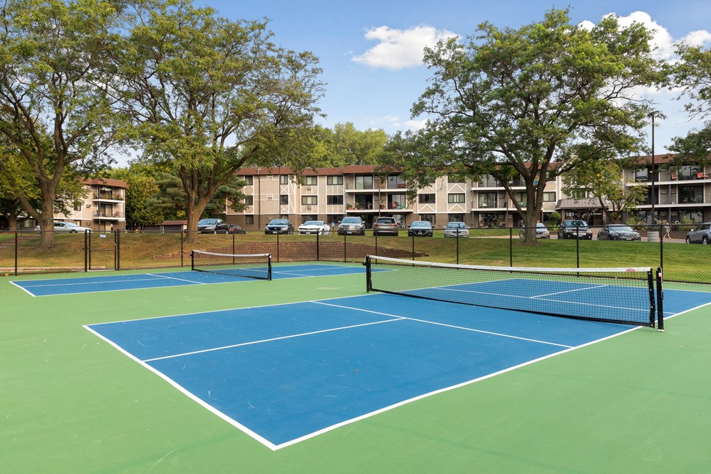 Play tennis  at Villages on McKnight, St. Paul, Minnesota