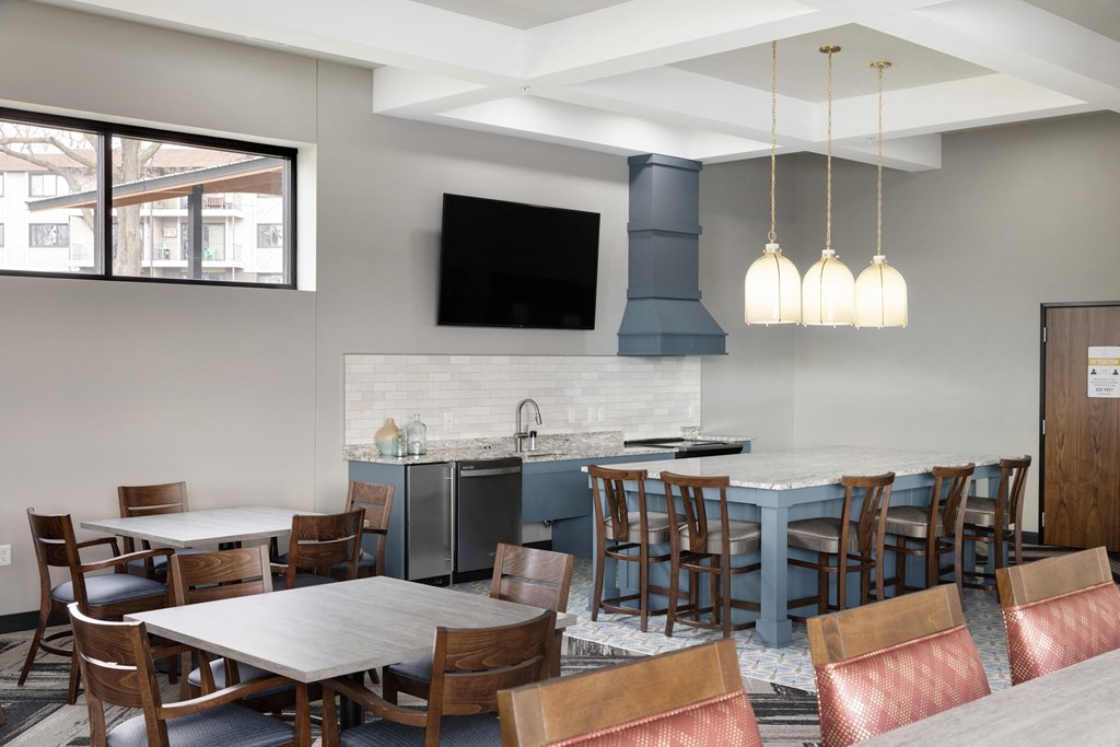 Resident dining room and lounge area  at Villages on McKnight, St. Paul, MN