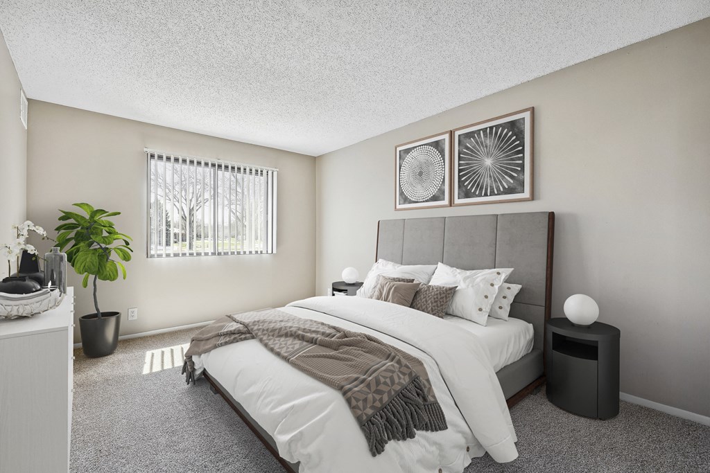 a bedroom with a bed and a window  at Willow Creek, Plymouth, 55441