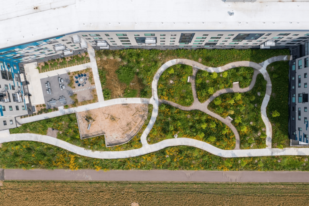 a birds eye view of a garden in a building at Zelia on Seven, St Louis Park, 55416