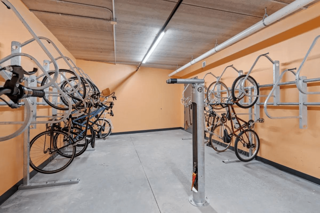 the gym with bikes hanging on the wall at Zelia on Seven, Minnesota