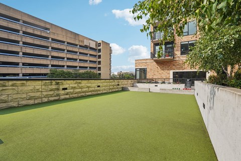 A game of bocce ball on a large turf area