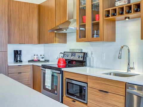 a kitchen with a stove and a sink