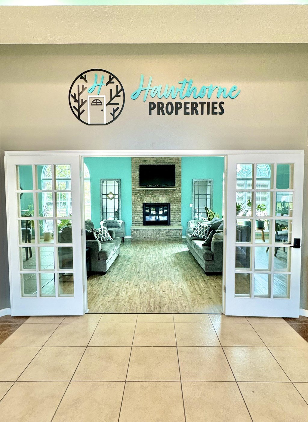 a view of a living room with a couch and a tv  at Hawthorne Properties in Lafayette, IN 47905