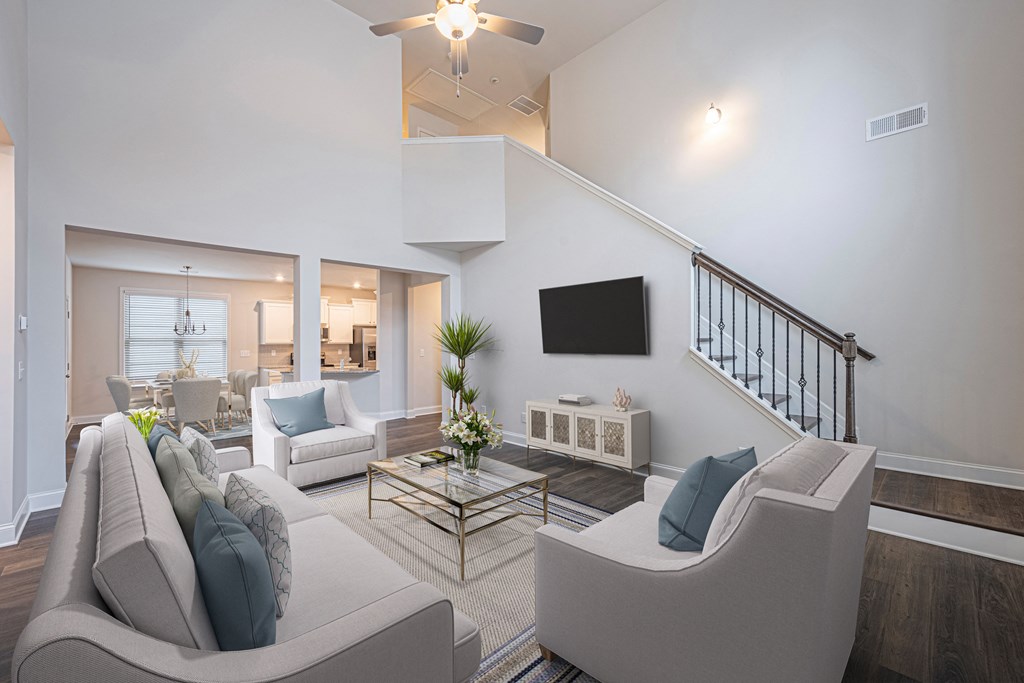 a living room with couches and a table