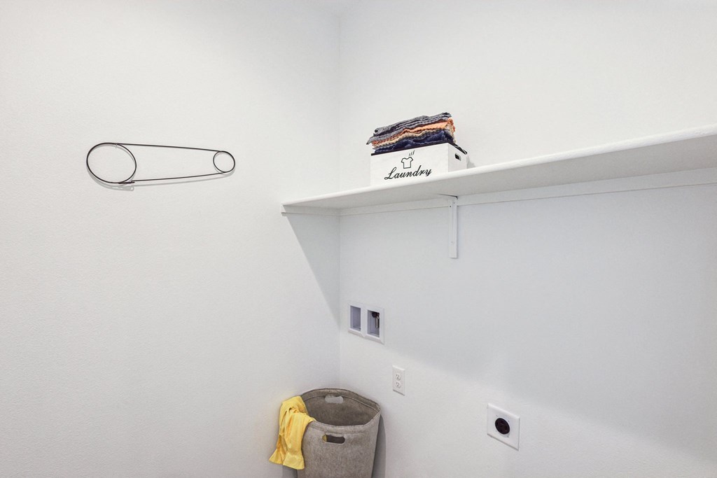 A laundry room with a washer and dryer.