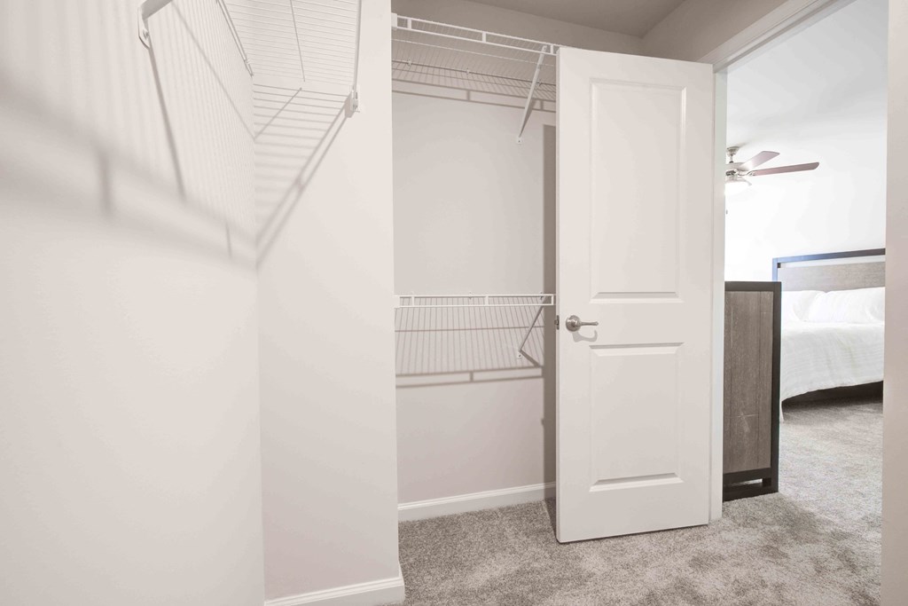 Pristine bathroom with elegant lighting fixtures and contemporary design elements throughout