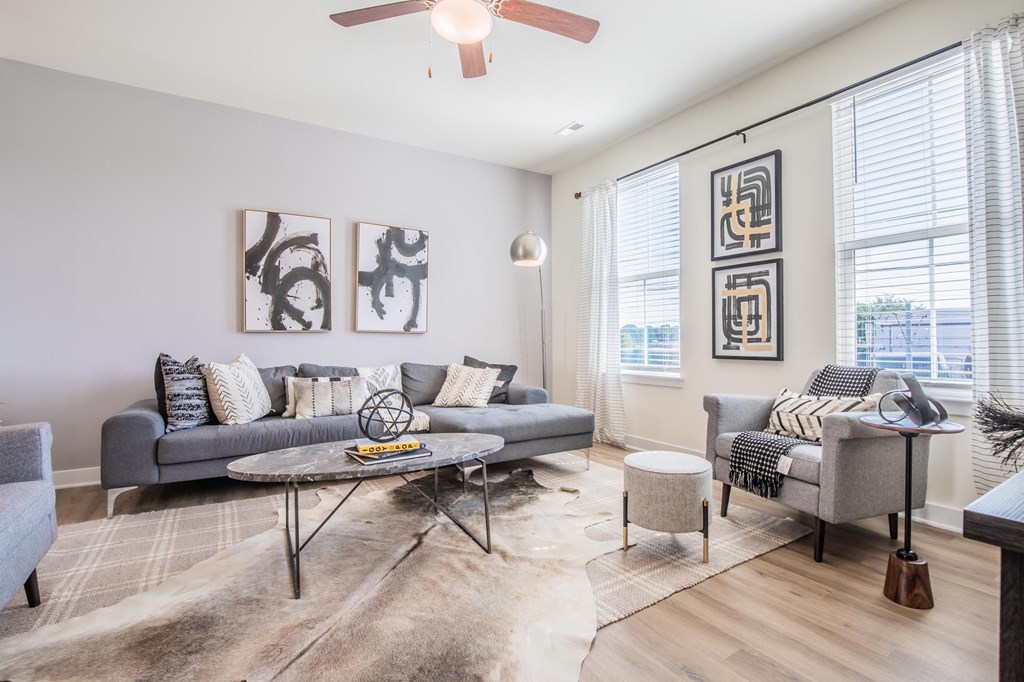 a living room with two couches and a coffee table