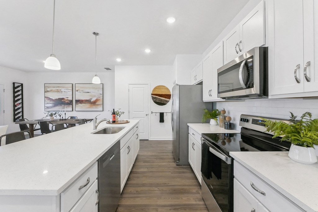 Gourmet kitchen featuring center island and stainless appliances