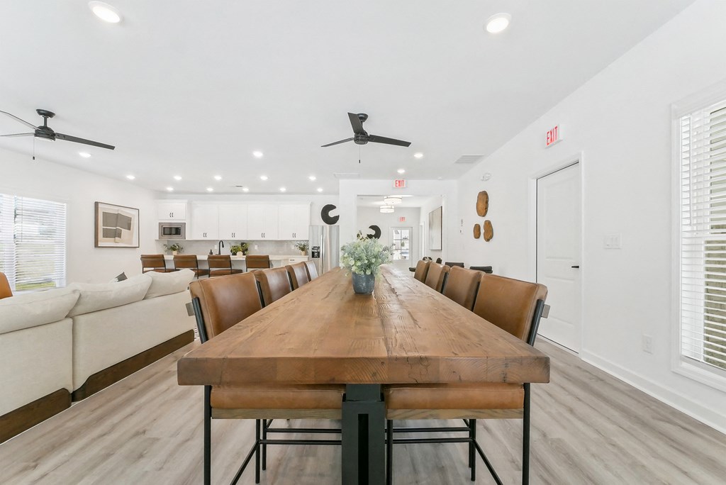 Open dining area with farmhouse table