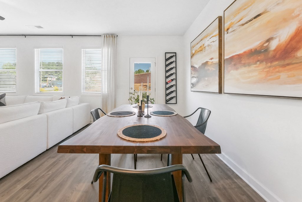 Spacious dining area with contemporary wood table