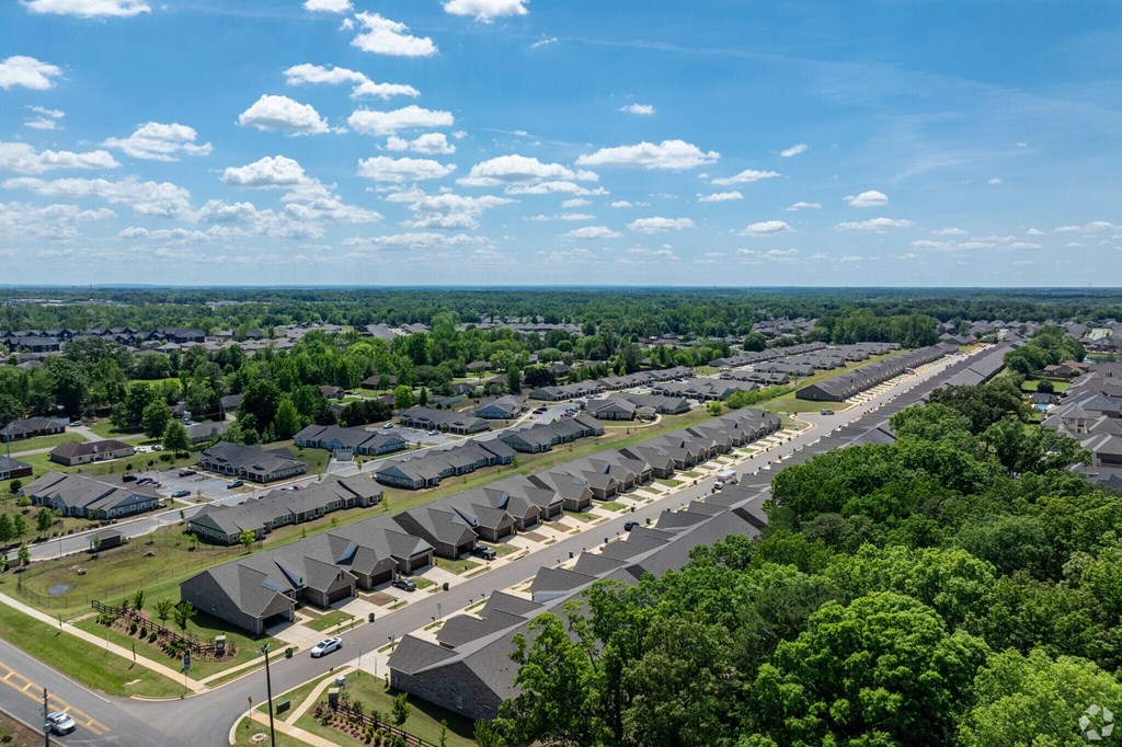 A suburban neighborhood with houses and trees.