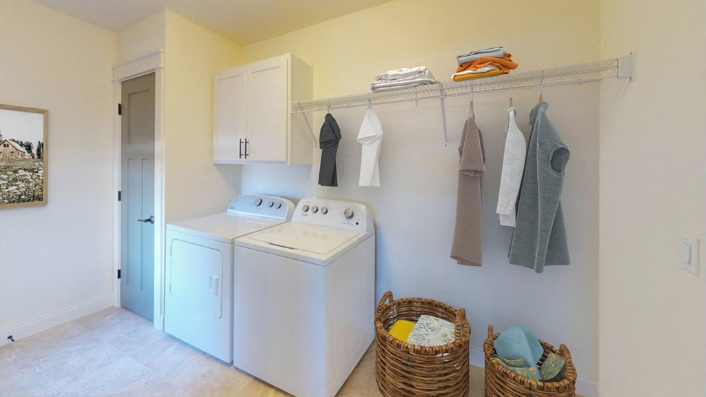 a washer and dryer in the laundry room of a home