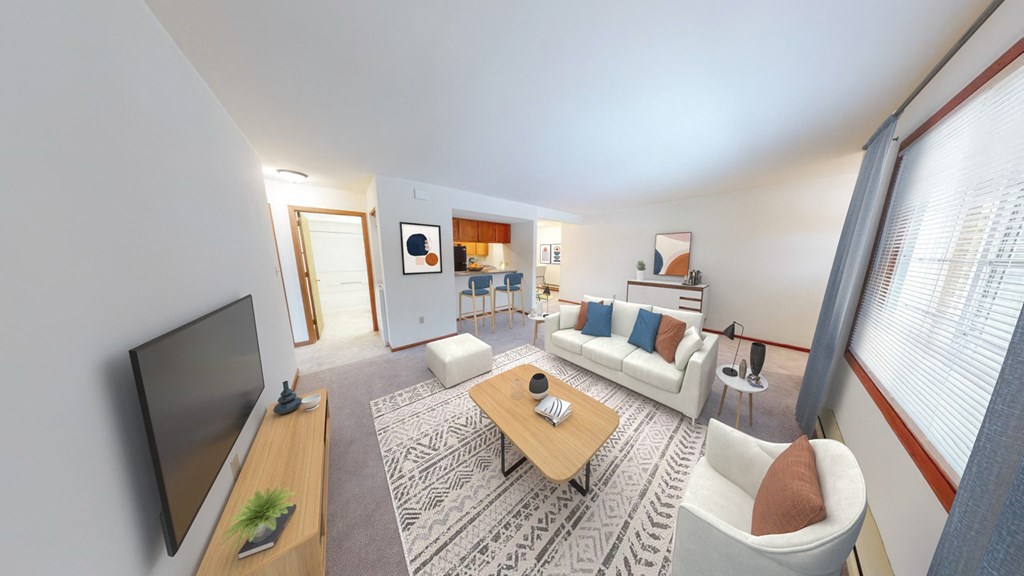 a living room with a couch and a tv